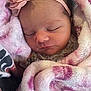 Serenity joined the competition — help win amazing prizes! newborn, baby, sleeping, blanket, headband, flower, soft_texture, closeup, face, peaceful, infant, wrapped, cute, pink, cozy, child, portrait, resting, tender, adorable