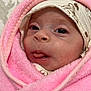 adorable, baby, child, closeup, cozy, cute, expression, face, hat, headwear, infant, newborn, pink_blanket, portrait, skin, sleepwear, soft_texture, tongue_out, warm, wrapped