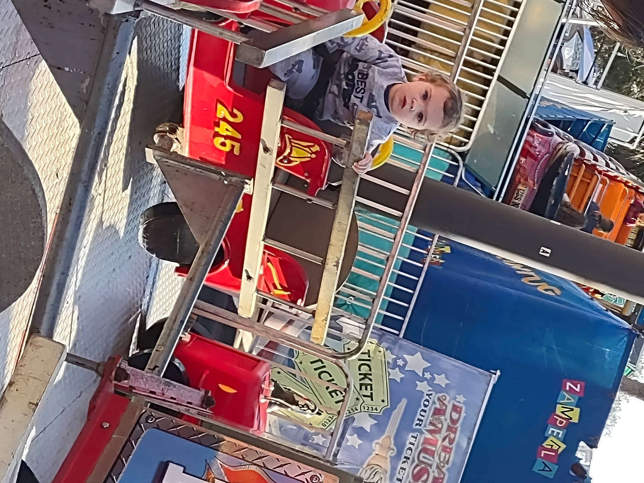 Luis joined the competition — help win amazing prizes! advertising, city, convenience_store, electronics, engineering, facade, font, fun, games, machine, pedestrian, person, publication, recreation, retail, shopping, street, t_shirt, technology, transport