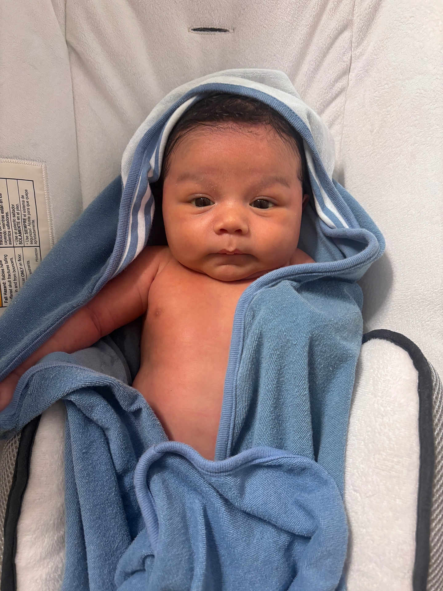 Elian joined the competition — help win amazing prizes! baby, towel, blue_towel, infant, child, face, skin, blanket, newborn, comfort, cute, expression, curious, portrait, indoors, soft, wrapped, resting, young, sleepy