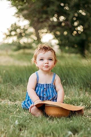 Lila joined the competition — help win amazing prizes! face, flash_photography, fun, grass, grass_family, grassland, happy, joy, leaf, leisure, meadow, people_in_nature, person, plant, recreation, shorts, skin, summer, sunlight, toddler