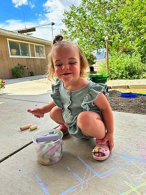 Lila is registered to the contest to win money with this photo: baby, building, child, cloud, easter, event, fun, grass, happy, joy, leisure, person, plant, play, recreation, sitting, sky, smile, toddler, tree