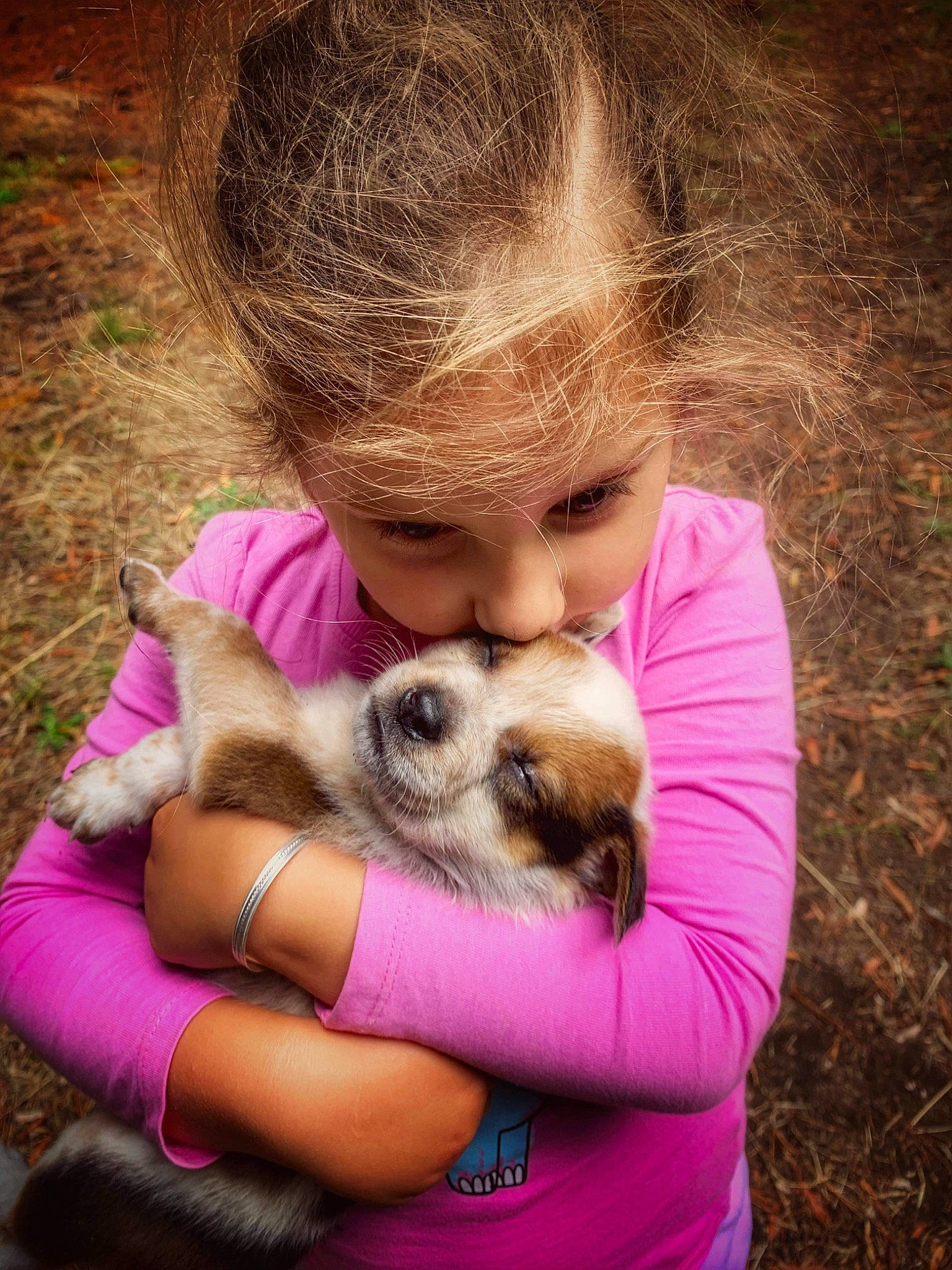 Starla is registered to the contest to win money with this photo: canidae, carnivore, child, companion_dog, dog_breed, eyelash, fawn, fur, grass, happy, mammal, mustelidae, person, sitting, snout, sporting_group, terrestrial_animal, vertebrate, whiskers, wildlife