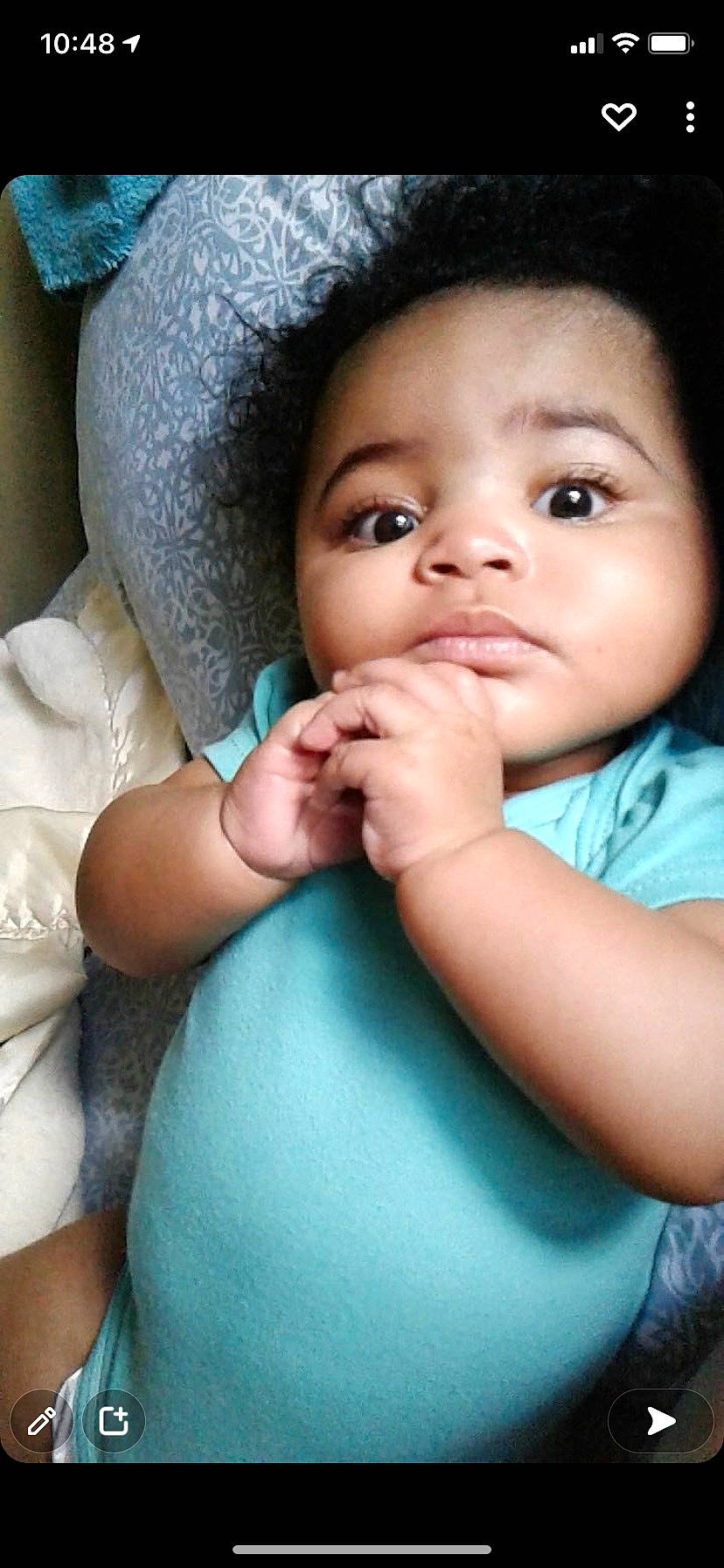 Nevaeh is registered to the contest to win money with this photo: arm, baby, baby_toddler_clothing, blue, cheek, comfort, eye, face, finger, flash_photography, gesture, hand, happy, iris, lip, mouth, nose, organ, person, skin