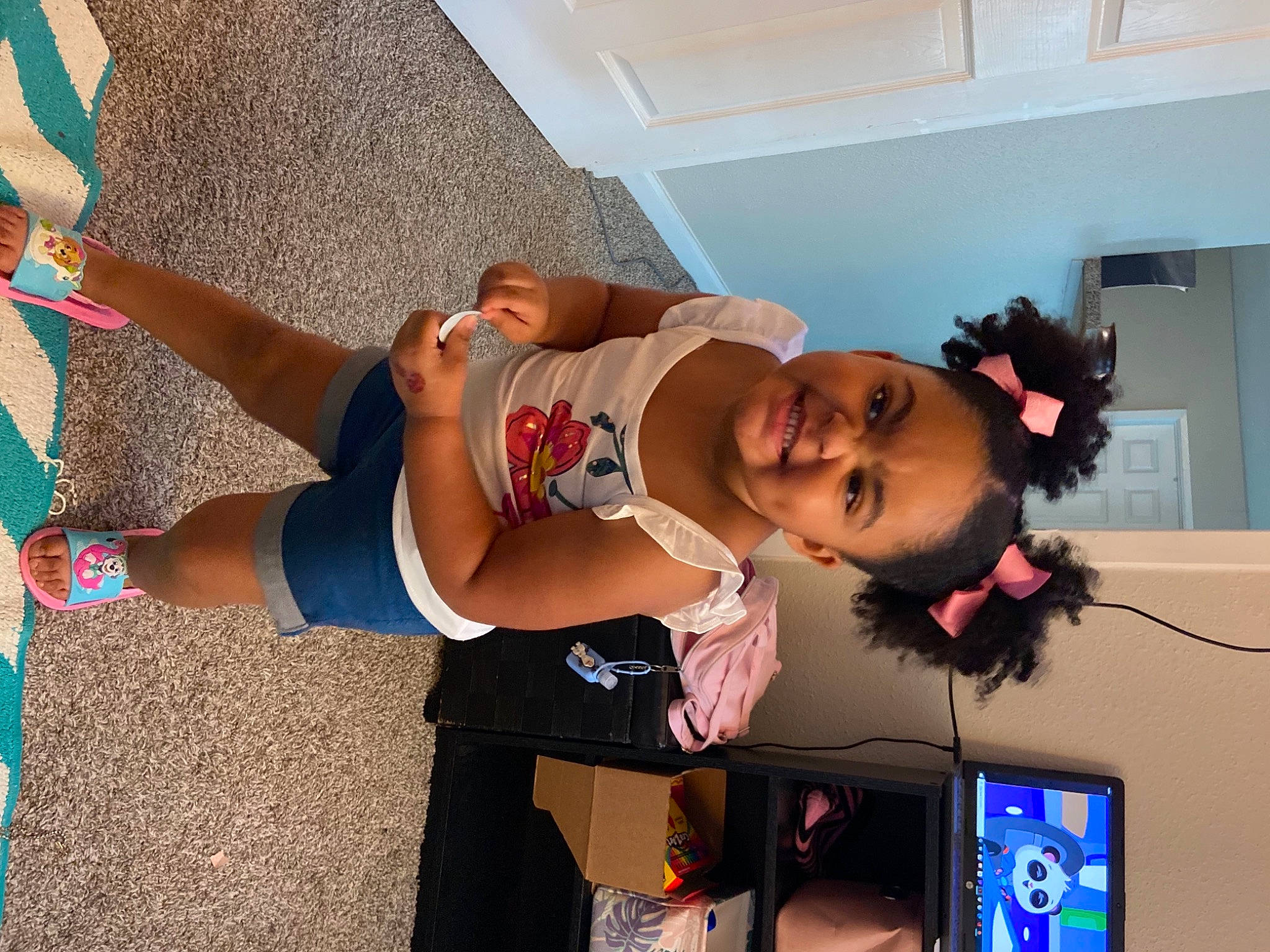 Nevaeh joined the competition — help win amazing prizes! arm, audio_equipment, child, communication_device, elbow, eyewear, fun, gadget, human_leg, joy, knee, leisure, person, portable_communications_device, room, sandal, smile, tablet_computer, thigh, toddler