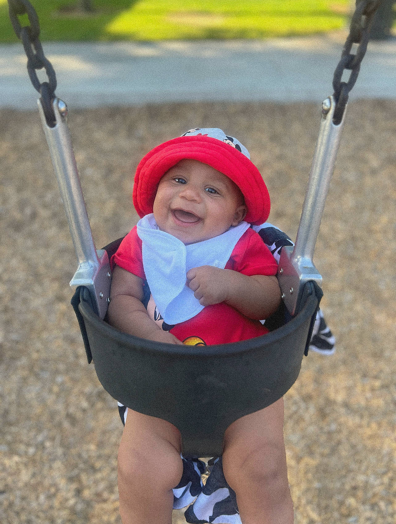 Amari joined the competition — help win amazing prizes! baby, baby_carriage, baby_products, baby_toddler_clothing, child, electric_blue, fun, happy, headwear, leisure, natural_environment, people, people_in_nature, person, photograph, product, recreation, smile, swing, toddler