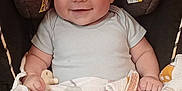 Royce joined the competition — help win amazing prizes! baby, smiling, car_seat, blanket, infant, child, cute, happy, face, clothing, sitting, indoors, person, head, expression, comfort, holding, pacifier, patterned_blanket, closeup