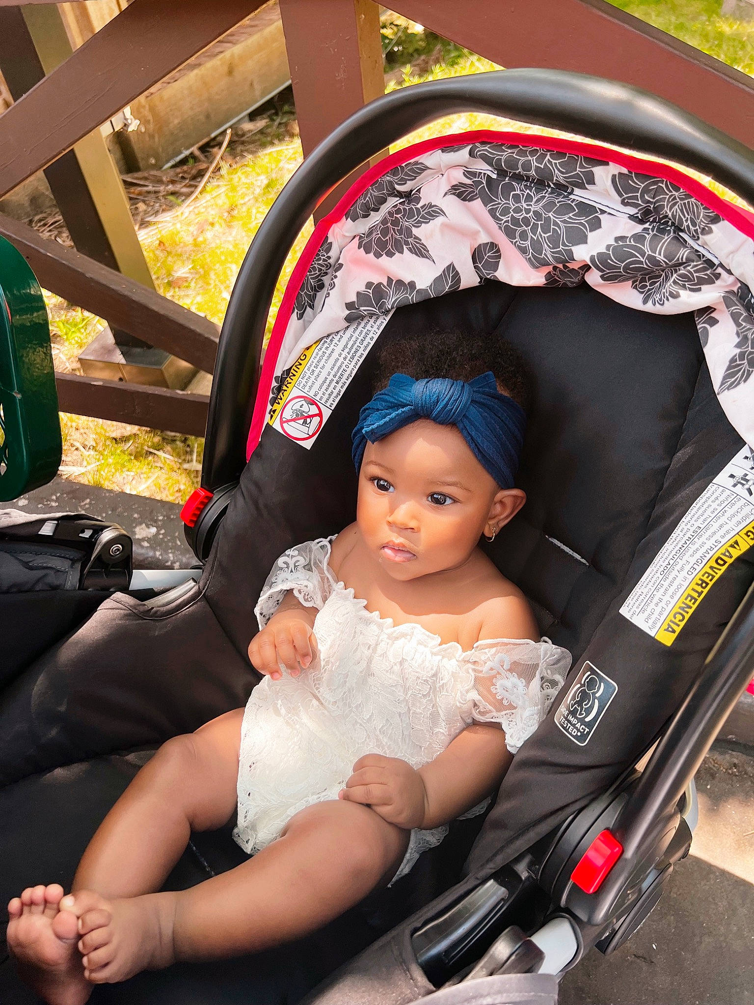 Sarah is registered to the contest to win money with this photo: auto_part, automotive_design, automotive_exterior, automotive_tire, automotive_wheel_system, baby, baby_carriage, baby_products, car_seat, comfort, fun, hat, headwear, leisure, motor_vehicle, person, sitting, steering_wheel, tire, toddler