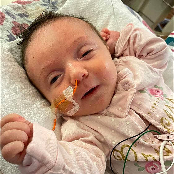 Adalynne is registered to the contest to win money with this photo: baby, baby_products, baby_sleeping, baby_toddler_clothing, cheek, child, comfort, ear, eyelash, finger, happy, lip, mouth, nail, nose, person, skin, sleeve, smile, thumb