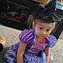 Millianna is registered to the contest to win money with this photo: accessories, bonnet, child, clothing, costume, dress, face, female, girl, hat, head, jewelry, necklace, partyhat, person, photography, plant, portrait, pottedplant, purple