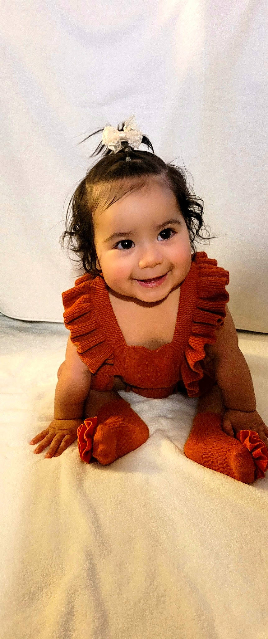 Aliana is registered to the contest to win money with this photo: abdomen, arm, baby, baby_toddler_clothing, child, eyebrow, eyelash, fashion_accessory, flash_photography, flooring, fun, gesture, happy, headband, headpiece, joy, nail, person, skin, smile