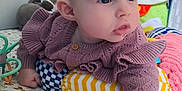 Charline a rejoint le concours — aidez-le/la à gagner de superbes lots ! baby, child, clothing, colorful, curious, cute, drool, face, indoor, infant, lying_down, patterned, play_mat, portrait, purple, small_hand, soft_toys, sweater, toys, wide_eyes