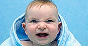Shaytan joined the competition — help win amazing prizes! baby, infant, face, expression, blue_blanket, wrapped, cute, portrait, child, smile, scrunched_nose, skin, head, ears, happy, indoors, closeup, young, background, blue