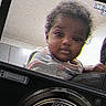 Zuri joined the competition — help win amazing prizes! black_camera, camera, camera_screen, child, close_up, curious, digital_camera, electronics, face, grainy, indoor, lens, looking_at_camera, photography, portrait, reflection, screen_lines, tilted, young_person, zoom_lens