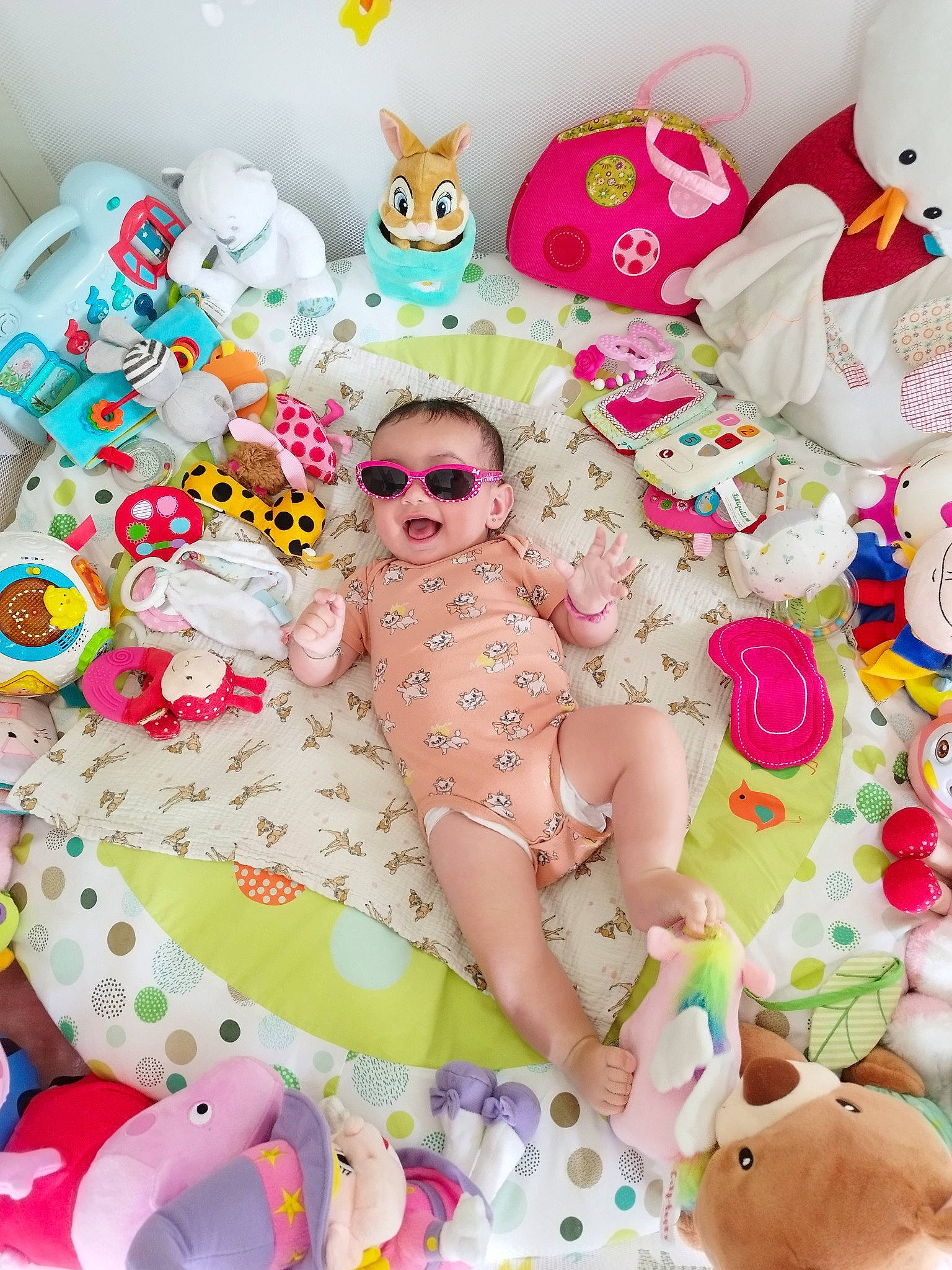 Innayah participe au concours pour gagner de l'argent avec cette photo : art, event, eyewear, facial_expression, fun, goggles, happy, leisure, magenta, pattern, people_in_nature, person, pink, play, stuffed_toy, sunglasses, textile, thigh, toy, white