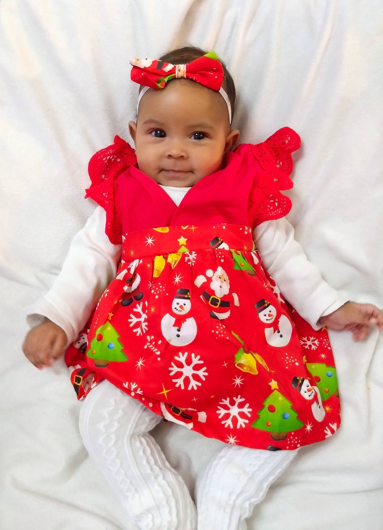 Zewenn participe au concours pour gagner de l'argent avec cette photo : baby, baby_toddler_clothing, child, collar, costume, event, face, fictional_character, happy, hat, headwear, human_body, magenta, pattern, peach, person, pink, red, sitting, sleeve