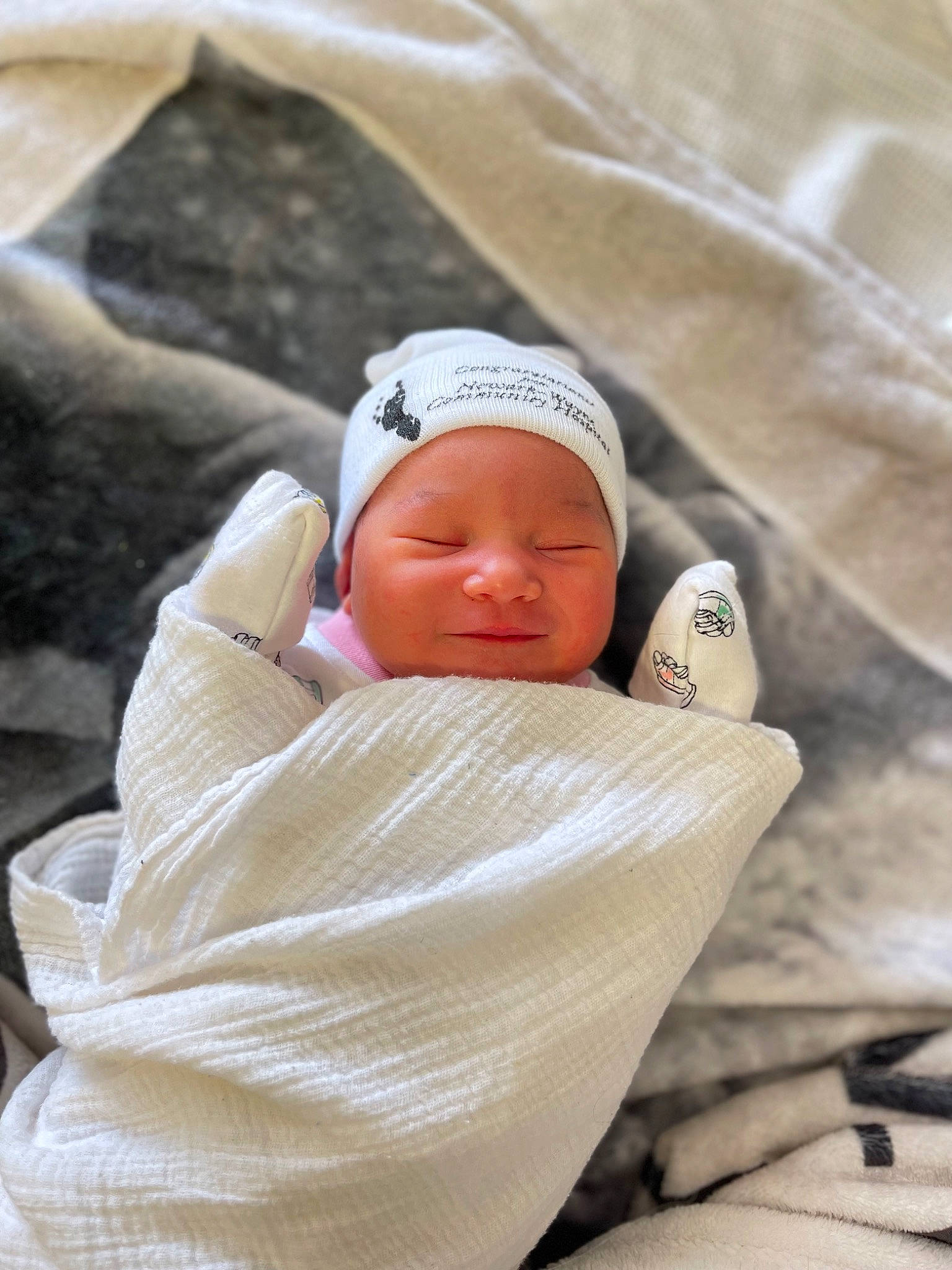 Genevieve joined the competition — help win amazing prizes! baby, baby_products, baby_sleeping, cap, child, comfort, eye, face, grass, hat, headgear, headwear, leisure, linens, nap, person, rock, sitting, sleep, toddler