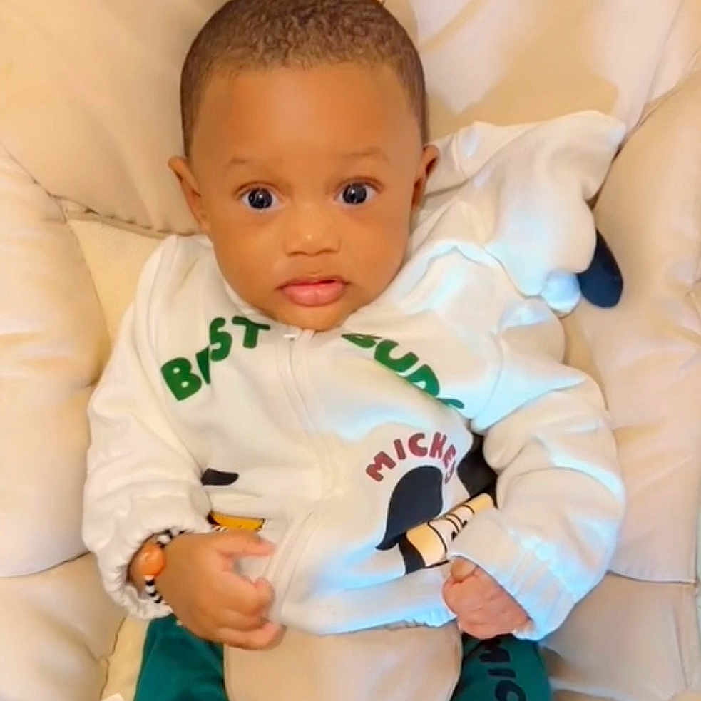 Dao Yerim participe au concours pour gagner de l'argent avec cette photo : adorable, baby, child, clothing, comfort, cushion, cute, expression, eyes, face, hands, indoor, infant, jacket, mickey_mouse, pants, person, seated, soft, young