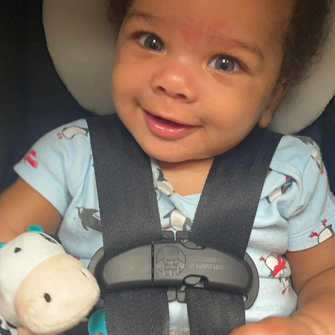 Khalyl joined the competition — help win amazing prizes! accessories, baby, belt, clothing, electronics, face, gun, happy, hat, head, helmet, machine, person, photography, portrait, seatbelt, smile, strap, weapon, wheel