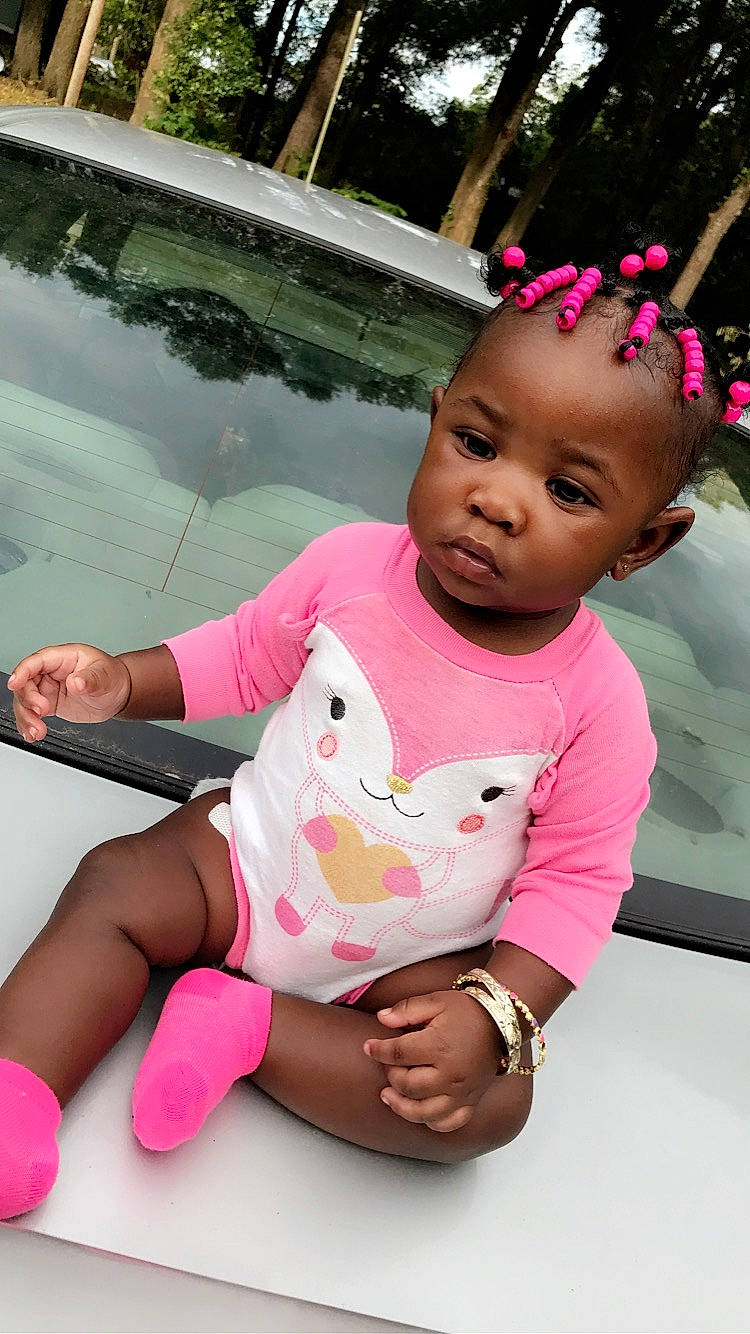 Amya Rain is registered to the contest to win money with this photo: baby, baby_toddler_clothing, cheek, child, hair_accessory, person, pink, skin, toddler