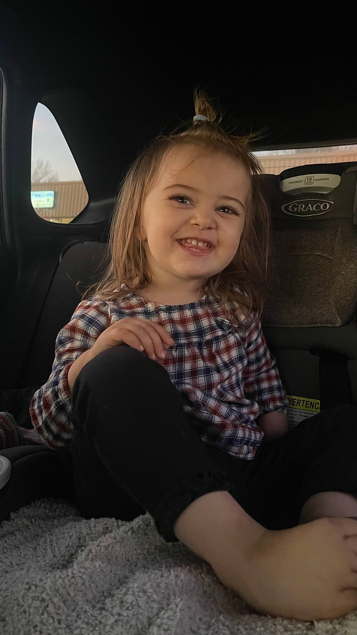 Ayla Mae is registered to the contest to win money with this photo: auto_part, automotive_design, blond, child, comfort, face, flash_photography, fun, happy, head, human_body, human_leg, joy, knee, luxury_vehicle, motor_vehicle, person, sitting, smile, thigh