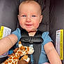 Audrey is registered to the contest to win money with this photo: baby, car_seat, blue_eyes, smile, plush_toy, giraffe, child, safety_harness, blanket, infant, cute, happy, person, young_child, seat_belt, toy, indoor, clothing, portrait, child_safety