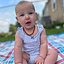 baby, child, infant, outdoor, blanket, blue_sky, grass, house, necklace, sitting, cute, patterned_clothing, happy, portrait, smiling, fingers, feet, face, summer, sunlight