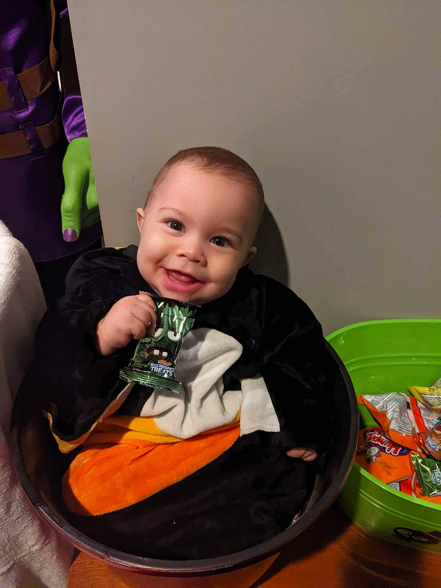 Garrett joined the competition — help win amazing prizes! baby, baby_products, baby_toddler_clothing, chair, cheek, child, comfort, eye, facial_expression, fun, hairstyle, happy, joy, orange, person, play, room, sitting, skin, sleeve