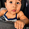 Kenai joined the competition — help win amazing prizes! toddler, child, face, hand, stroller, curious, blue_clothing, skin, portrait, baby, cute, expression, wide_eyes, close_up, infant, outdoor, young_child, grip, person, casual