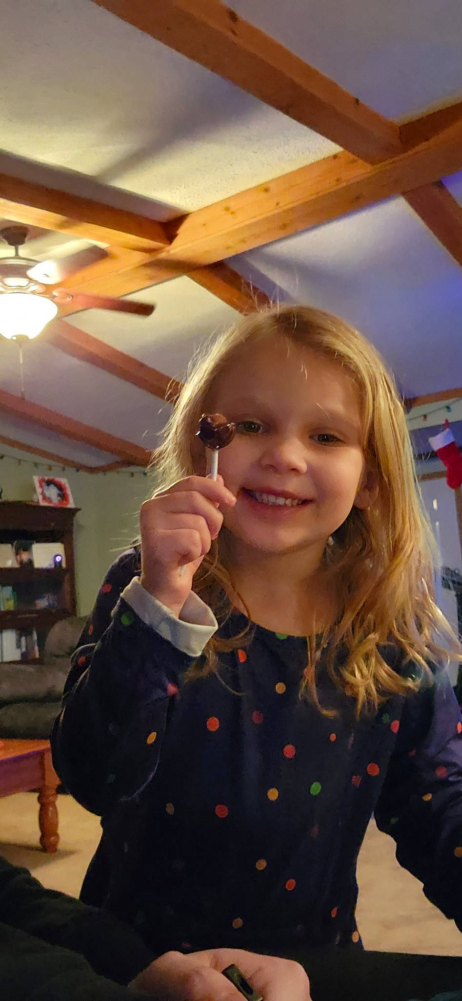 Elliana is registered to the contest to win money with this photo: bookcase, ceiling, ceiling_fan, child, event, fun, gesture, happy, jewellery, joy, laugh, pattern, person, room, shelf, sleeve, smile, t_shirt, thumb, toddler