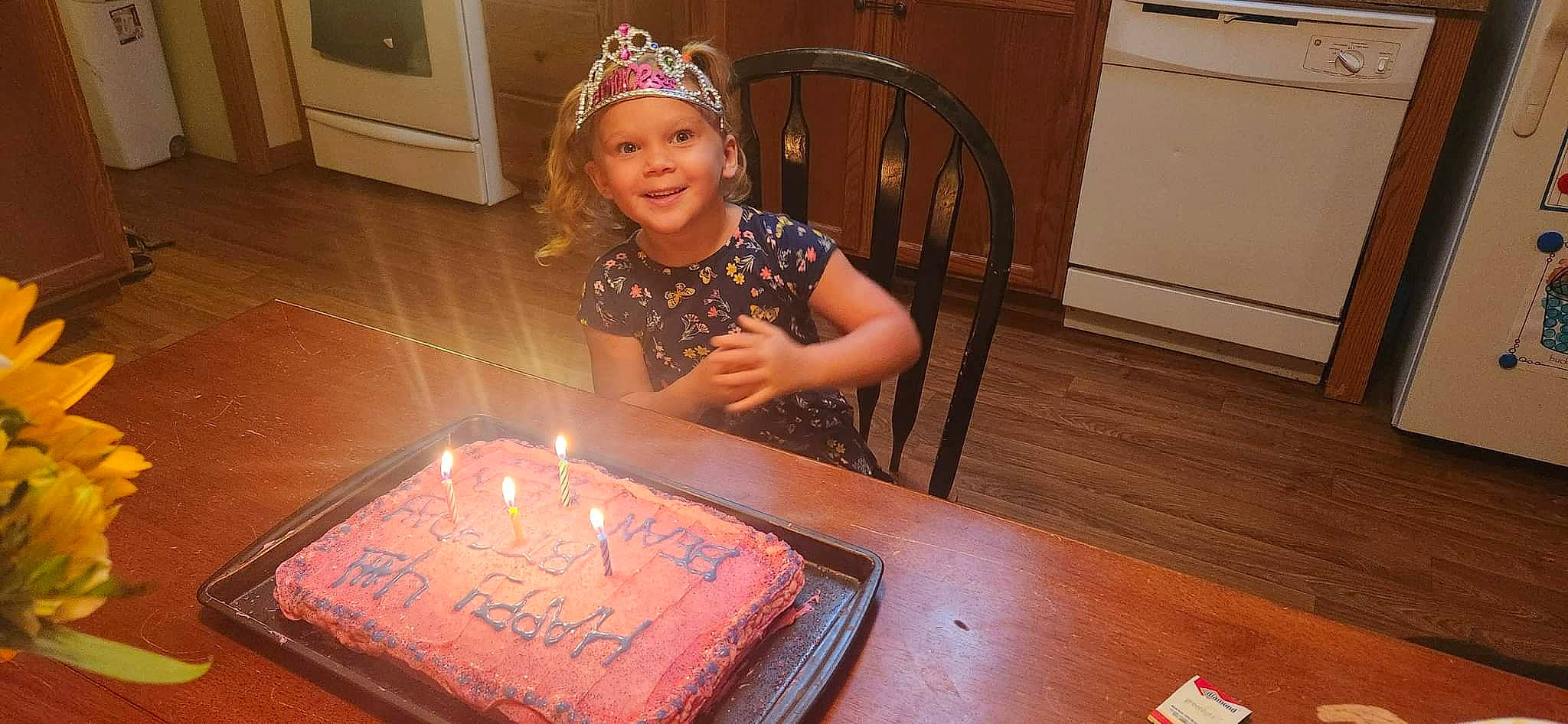 Elliana is registered to the contest to win money with this photo: baked_goods, birthday, birthday_cake, birthday_candle, buttercream, cabinetry, cake, cake_decorating, cake_decorating_supply, candle, chair, cuisine, event, food, fun, headwear, joy, person, smile, sugar_paste