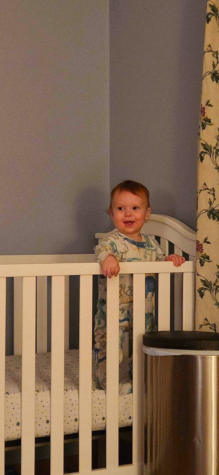Jorah is registered to the contest to win money with this photo: baby, baby_safety, baby_toddler_clothing, baluster, child, comfort, curtain, flooring, hardwood, joy, linens, nursery, pattern, person, room, sitting, sleeve, smile, t_shirt, toddler