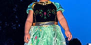 Naomi is registered to the contest to win money with this photo: child, clothing, costume, dress, eveningdress, face, fashion, female, footwear, formalwear, girl, head, pants, person, photography, portrait, sandal, shoe, skirt, standing
