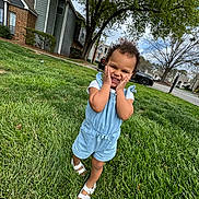 Naomi is registered to the contest to win money with this photo: architecture, baby, backyard, building, clothing, face, grass, head, lawn, nature, neighborhood, outdoors, person, photography, plant, portrait, shelter, summer, tree, yard