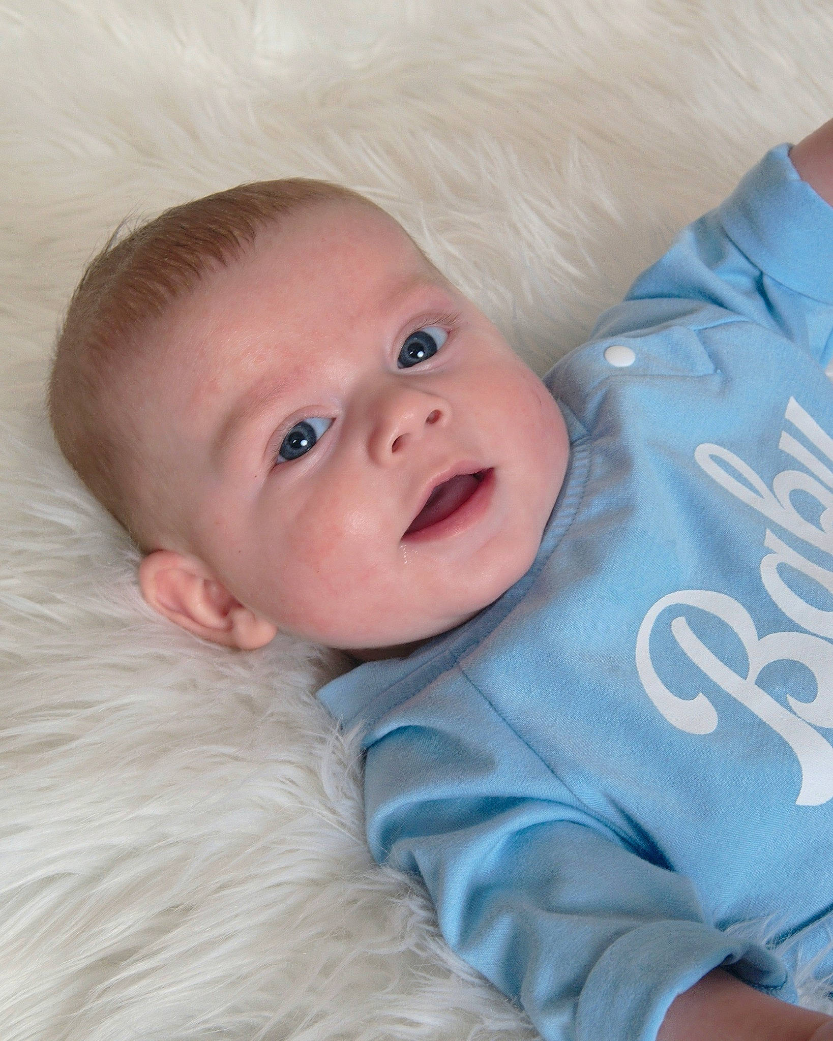 Mathew joined the competition — help win amazing prizes! baby, baby_products, baby_toddler_clothing, cheek, child, comfort, electric_blue, eye, fun, fur, happy, iris, laugh, linens, person, portrait_photography, sitting, skin, sleeve, smile
