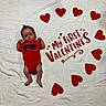 Izaiah joined the competition — help win amazing prizes! baby, infant, red_onesie, blanket, valentines_day, hearts, text_overlay, cute, lying_down, small_person, celebration, holiday, love, white_background, newborn, portrait, child, adorable, festive, infant_face