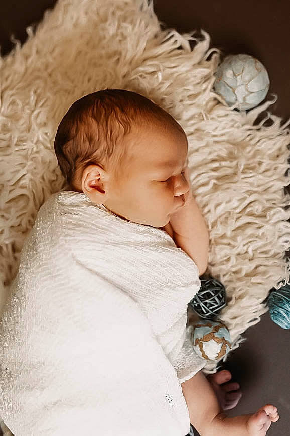 Casen is registered to the contest to win money with this photo: baby, baby_sleeping, baby_toddler_clothing, cheek, child, comfort, fur, happy, iris, linens, nail, pattern, person, portrait_photography, product, room, skin, sleeve, toddler