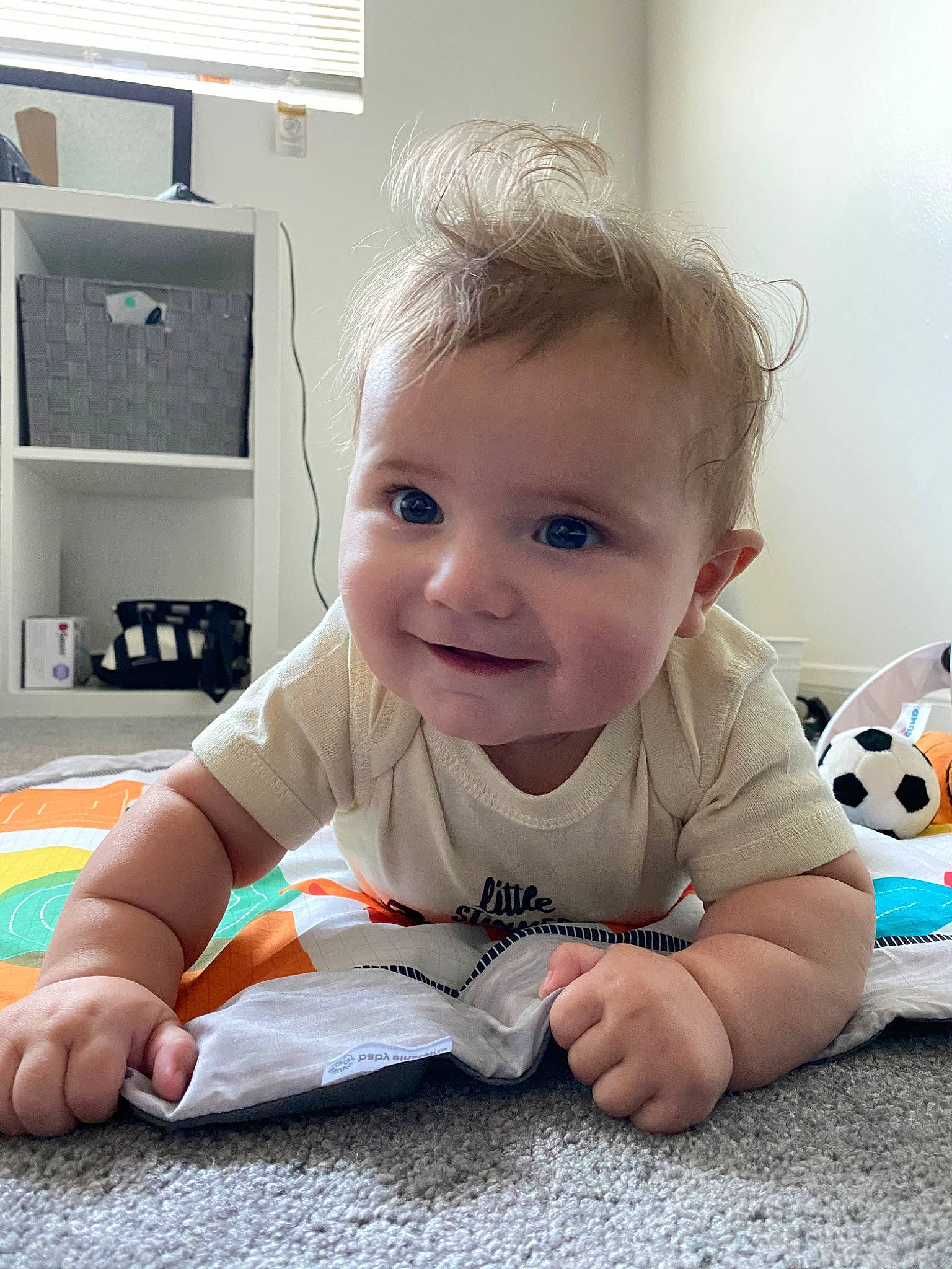 Matteo joined the competition — help win amazing prizes! baby, blond, cheek, child, crawling, electronic_device, eye, floor, flooring, head, joy, person, play, room, sitting, skin, toddler, toy, tummy_time