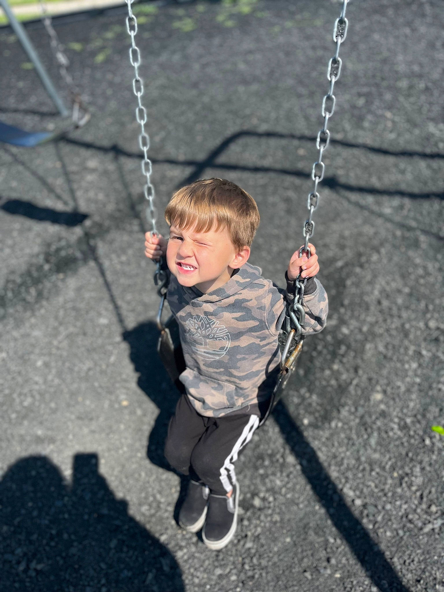 D.j is registered to the contest to win money with this photo: baby, child, city, electric_blue, fashion_accessory, fun, grass, happy, head, jewellery, leisure, person, plant, playground, recreation, smile, swing, toddler, tree, white