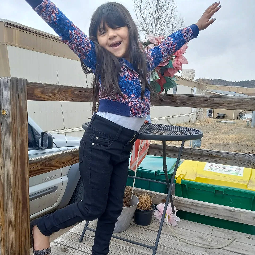 Serenity is registered to the contest to win money with this photo: belt, denim, electric_blue, fashion_accessory, fun, happy, joy, leisure, pattern, person, recreation, sitting, sky, sleeve, smile, thigh, tourism, travel, vacation, waist