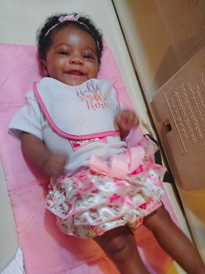 Alaila is registered to the contest to win money with this photo: abdomen, baby_products, child, day, girl, infant, person, pink, product, skin, smile, textile, toddler