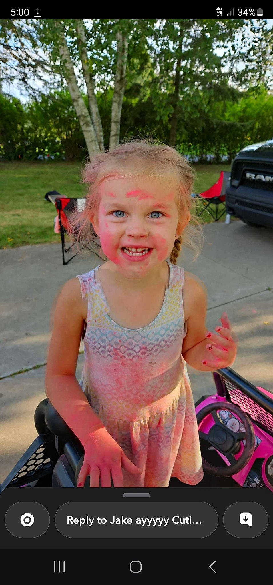 Raegan is registered to the contest to win money with this photo: asphalt, automotive_design, automotive_exterior, automotive_lighting, car, fun, grass, happy, hood, joy, leisure, motor_vehicle, person, pink, plant, public_space, recreation, skin, smile, summer