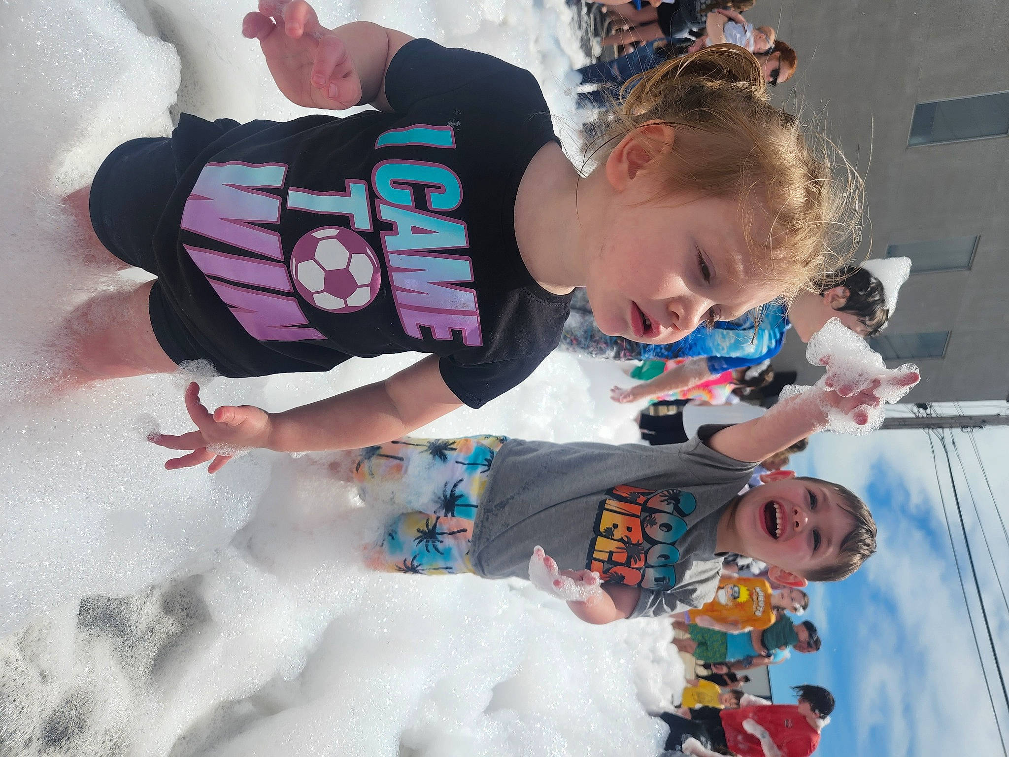 Lani is registered to the contest to win money with this photo: child, event, eyewear, fun, happy, leisure, person, personal_protective_equipment, play, recreation, sleeve, snow, t_shirt, toddler, vacation, water, winter, world