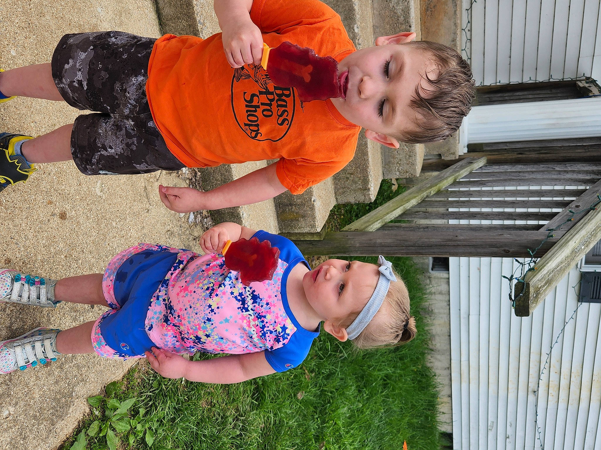 Lani is registered to the contest to win money with this photo: arm, baby_toddler_clothing, child, clothing, eye, face, grass, green, happy, headwear, leisure, people, people_in_nature, person, photograph, red, shoe, shorts, smile, thigh