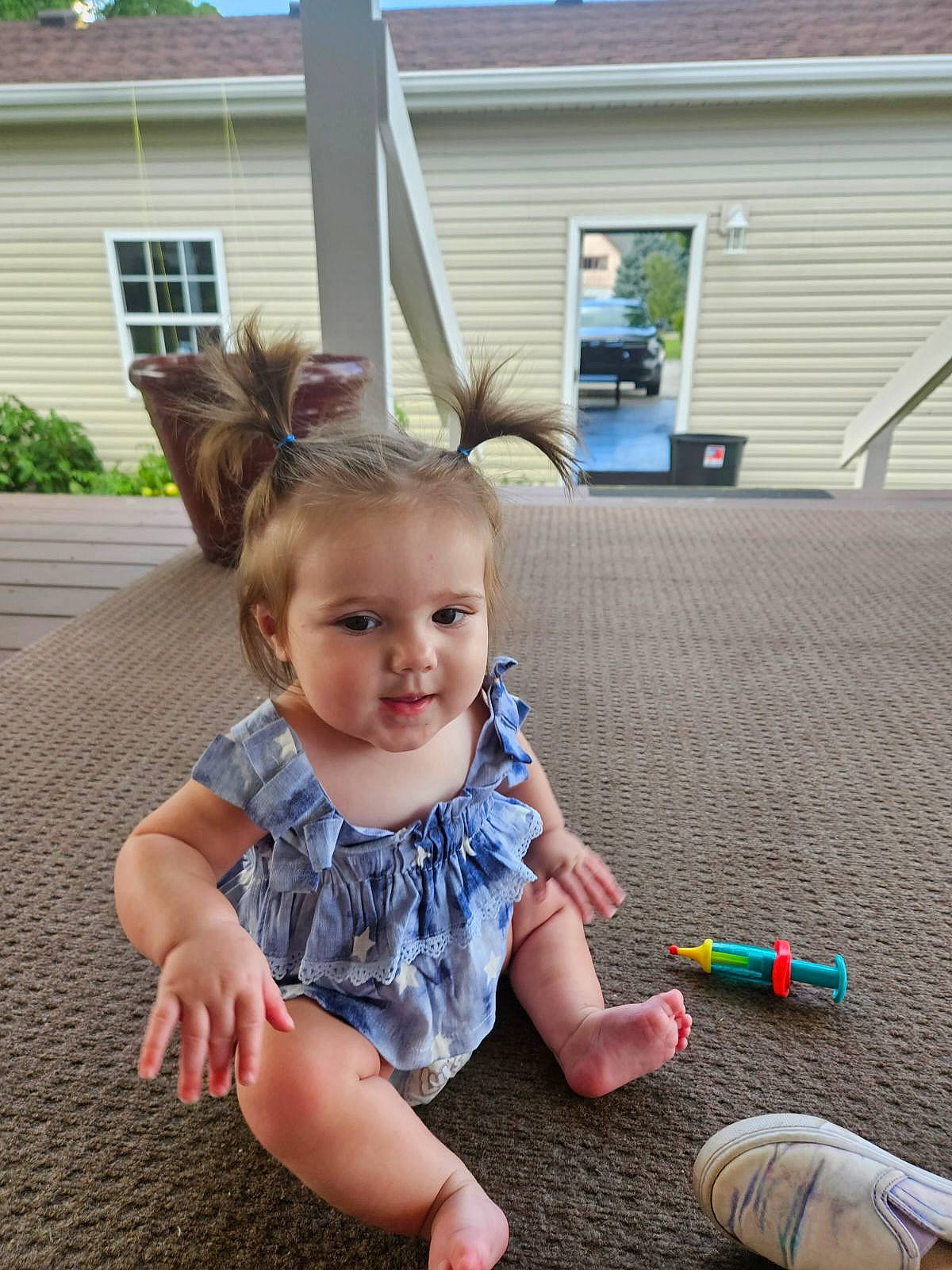 Paige joined the competition — help win amazing prizes! asphalt, baby_toddler_clothing, child, flooring, fun, grass, happy, house, leisure, musical_instrument, pattern, person, plant, play, recreation, sitting, smile, t_shirt, toddler, window