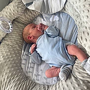 Freddie joined the competition — help win amazing prizes! baby, baby_bedding, baby_lounger, blue_onesie, child, cozy, cute, indoor, infant, newborn, nursery, pacifier, peaceful, plush, portrait, resting, sleeping, soft_texture, striped_socks, stuffed_animal