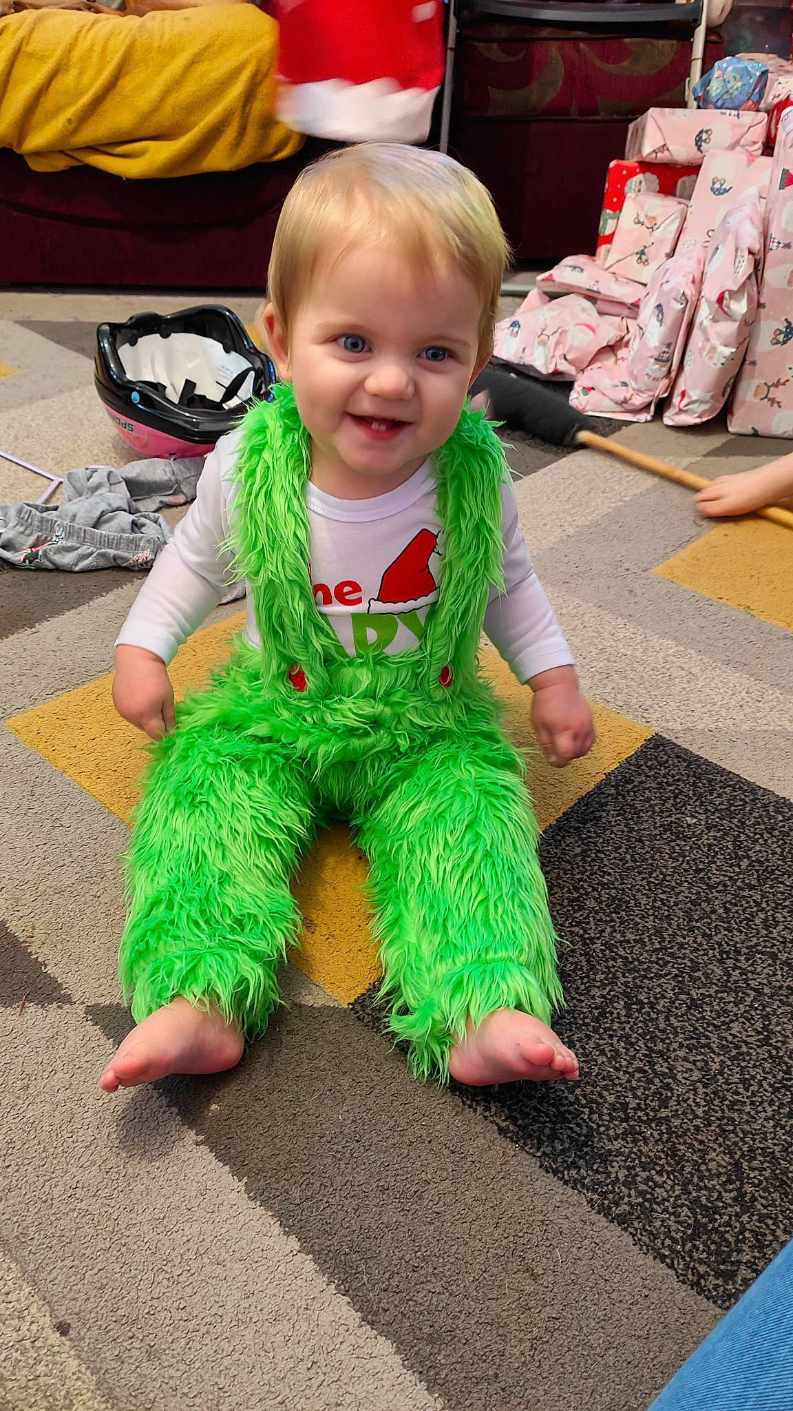 Arya joined the competition — help win amazing prizes! baby, baby_toddler_clothing, barefoot, child, event, face, flooring, foot, fun, grass, happy, holiday, joy, pajamas, pattern, person, play, sitting, sleeve, smile