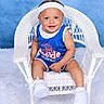 toddler, child, basketball, blue_outfit, headband, white_shoes, wicker_chair, smiling, portrait, studio_photo, indoor, cute, happy, sitting, baby, sportswear, background, footwear, person, young_child
