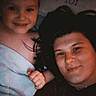 Braylyn is registered to the contest to win money with this photo: child, toddler, adult, selfie, portrait, smiling, indoors, close_up, face, hair, dark_lighting, casual, shoulder, tshirt, family, companionship, photograph, vintage, vertical, happy