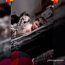 child, sleeping, bed, blanket, striped_blanket, bedroom, portrait, face, brown_hair, indoors, cozy, tired, lying_down, bedding, furniture, home, nighttime, soft_lighting, social_media, heart_decorations